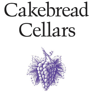 The image shows the text Cakebread Cellars above a detailed, purple illustration of a grape cluster with leaves.