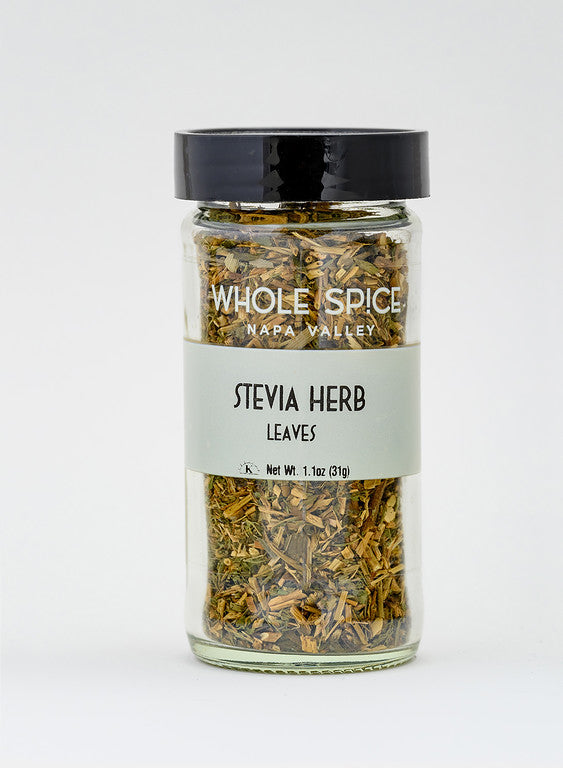 A clear glass jar with a black lid contains Stevia Leaf by Whole Spice Inc., labeled "Stevia Herb Leaves, Net Wt. 1.1oz (31g).