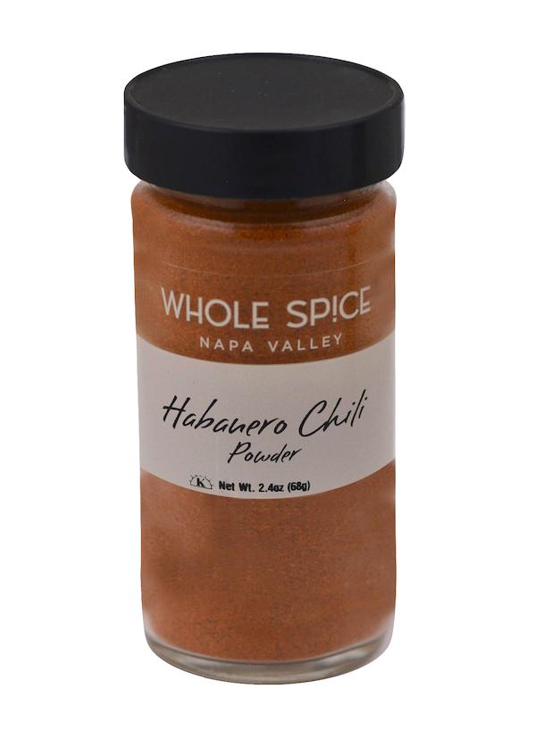 Whole Spice Inc. Habanero Chili Powder is a jar of fiery brown powder made from some of the hottest chilies, delivering intense flavor and high Scoville heat units.