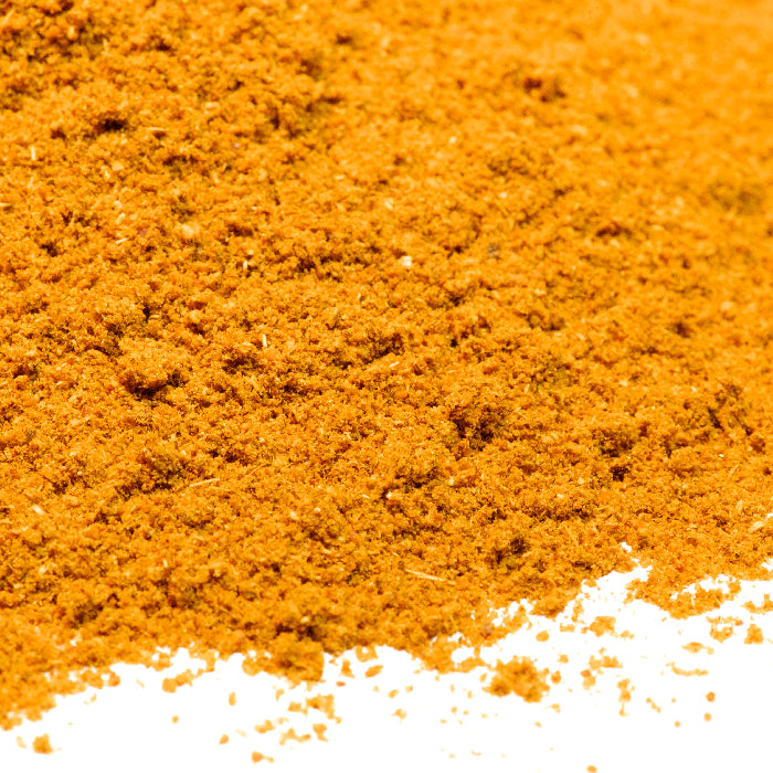 Sri Lankan Curry Powder by Whole Spice Inc. is a vibrant yellow spice blend, capturing the authentic flavors of traditional Sri Lankan curry.