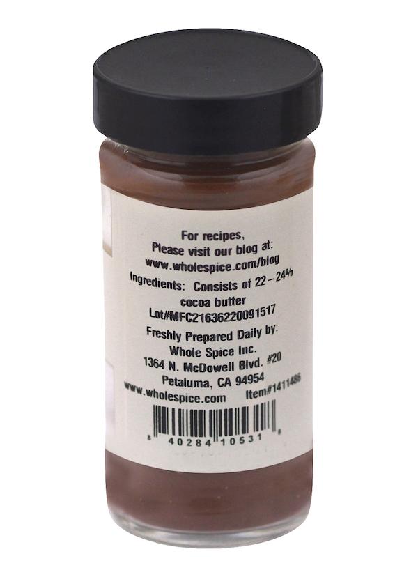 A jar of peanut butter, perfect for pairing with Whole Spice Inc. Cocoa Powder or as a creamy layer in your favorite chocolate cake recipes.