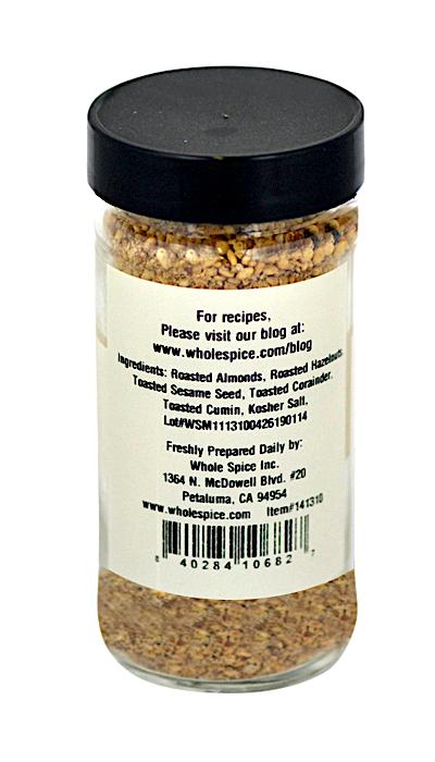 A jar of Dukka by Whole Spice Inc., featuring the Egyptian spice blend made with toasted sesame.