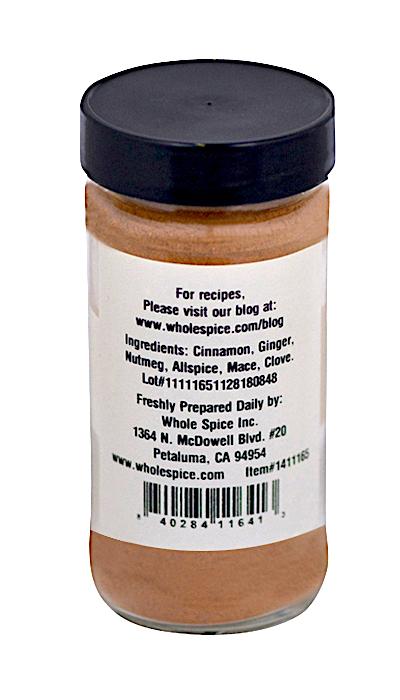 Whole Spice Inc. Pumpkin Pie Spice comes in a clear jar with a black lid and white label listing cinnamon, ginger, nutmeg, allspice, mace, and clove—perfect for your holiday baking needs.