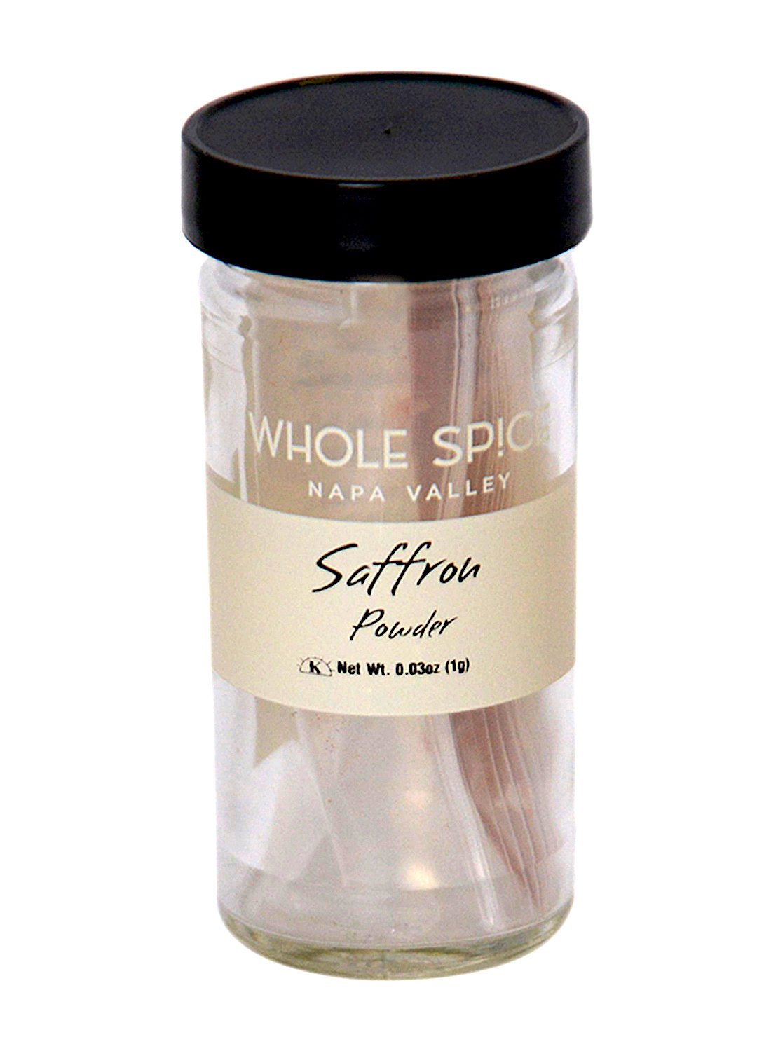 A clear glass jar with a black lid, labeled Whole Spice Inc. Saffron Powder. This premium Moroccan saffron powder includes a beige and white label with the product name and a net weight of 0.03 oz (1g).