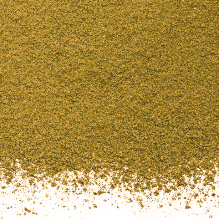 A pile of green powder, Sage Powder by Whole Spice Inc., a popular culinary herb used to add robust flavor to Mediterranean cuisine.