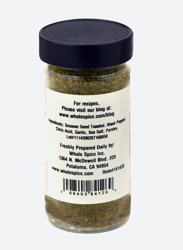 Tahini Dry Mix by Whole Spice Inc. comes in a clear jar with a black lid and label listing sesame seed, black pepper, citric acid, garlic, sea salt, and parsley—ideal for homemade tahini or enhancing your favorite tahini sauce.