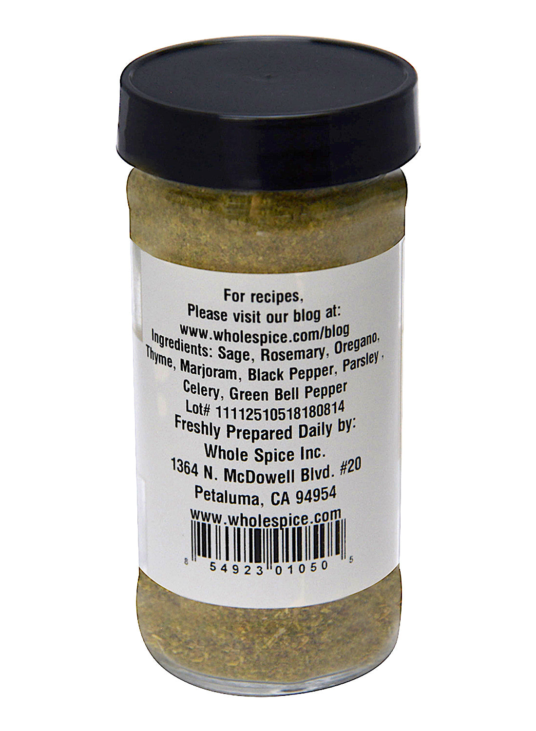 Whole Spice Inc.'s Turkey Stuffing Mix comes in a clear plastic jar with a black lid, featuring a label listing sage, rosemary, oregano, and more. Ideal for holiday turkey or roasted chicken. The label includes the company’s address and website for recipes.